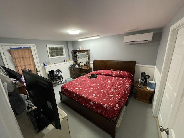 bedroom with a wall mounted AC