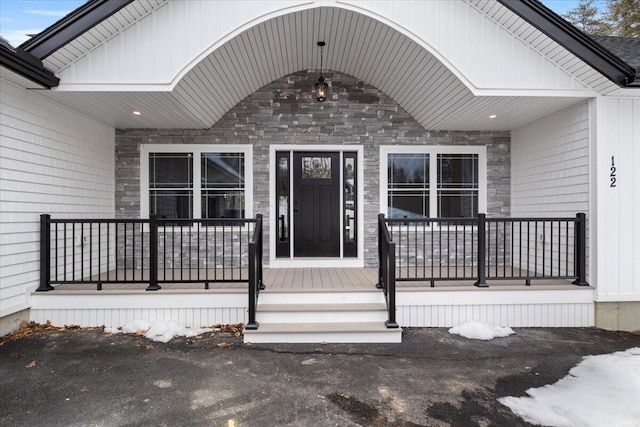 entrance to property with covered porch