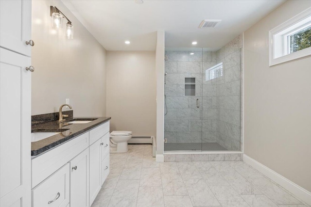 full bath with a baseboard radiator, toilet, a sink, visible vents, and a shower stall