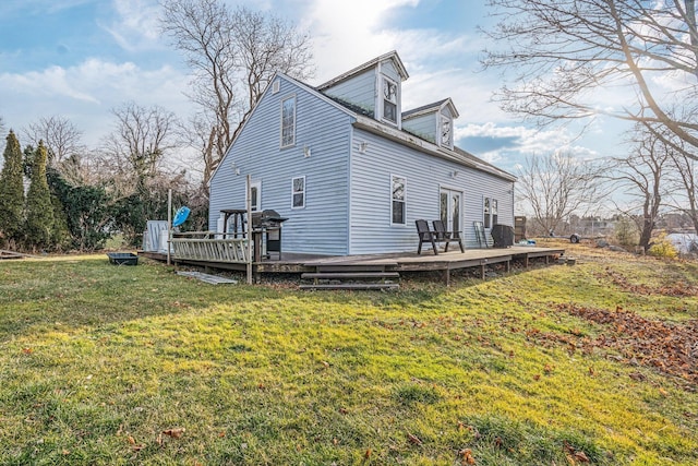 view of home's exterior with a lawn and a wooden deck