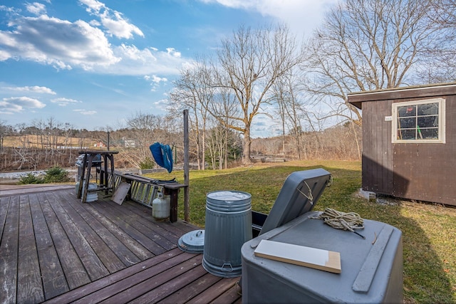 wooden terrace with a yard