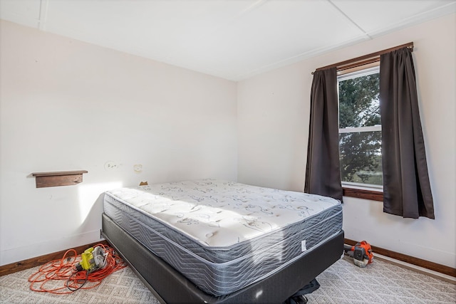 bedroom featuring multiple windows