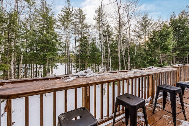 view of snow covered deck