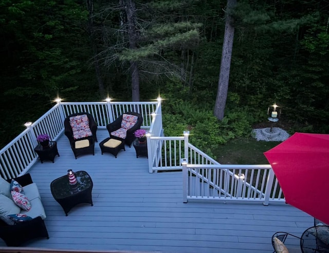 wooden deck with outdoor lounge area