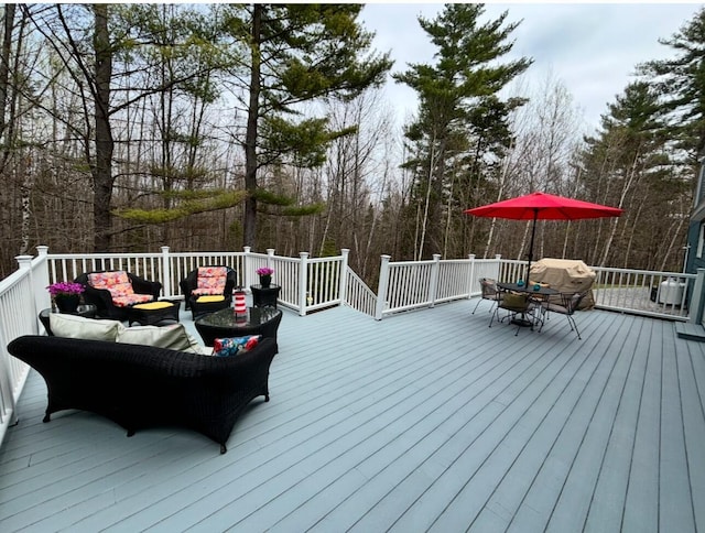 deck with an outdoor hangout area