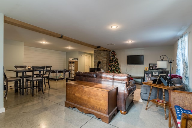 living room with a wood stove