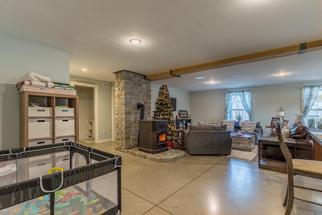 living room featuring a wood stove