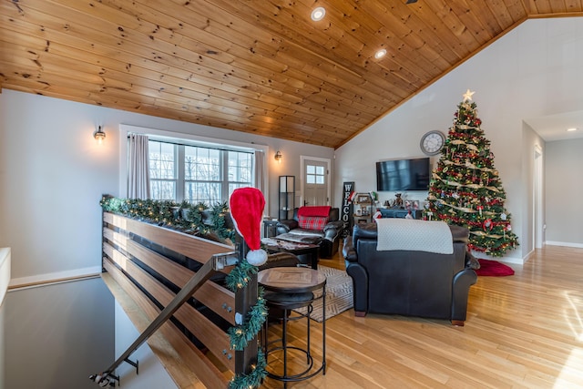 living room with light hardwood / wood-style flooring, wood ceiling, and lofted ceiling