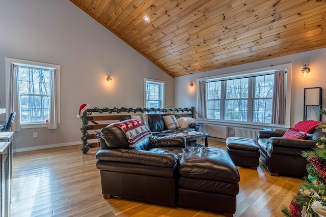 living room featuring plenty of natural light, high vaulted ceiling, wooden ceiling, and light wood-type flooring