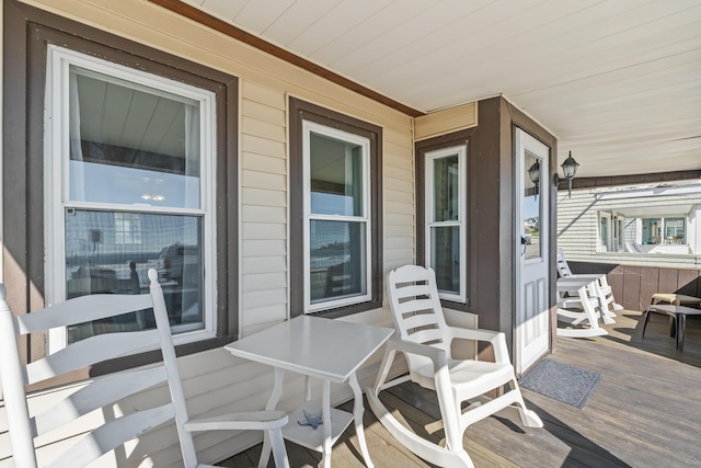 wooden deck with a porch