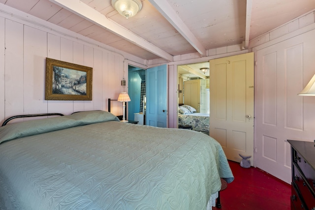 bedroom featuring beam ceiling and wood ceiling