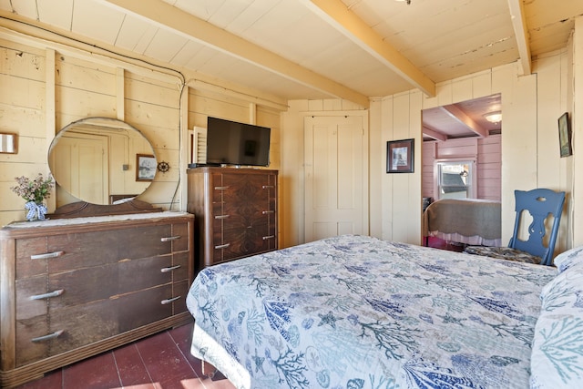 bedroom featuring dark wood-style floors, beamed ceiling, wood ceiling, and wood walls