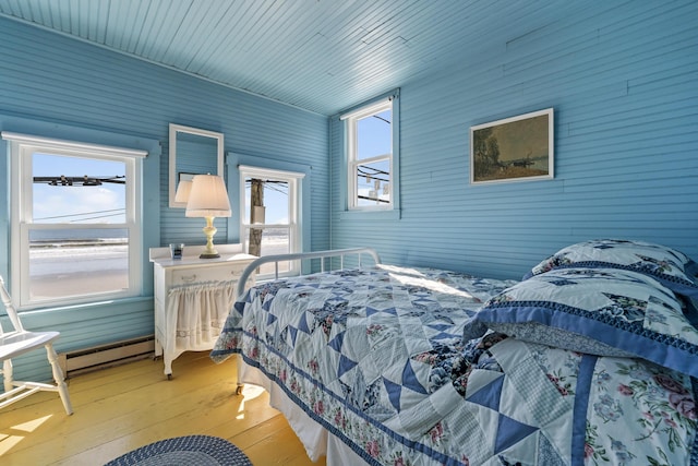 bedroom featuring light wood-style floors