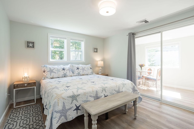 bedroom featuring hardwood / wood-style flooring