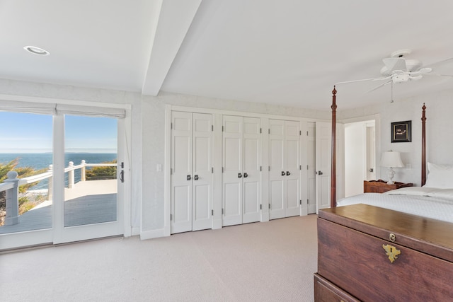 95 Pumpkin Cove Rd, Bristol, ME 04554 - carpeted bedroom featuring ceiling fan, a water view, two closets, access to outside, and beamed ceiling
