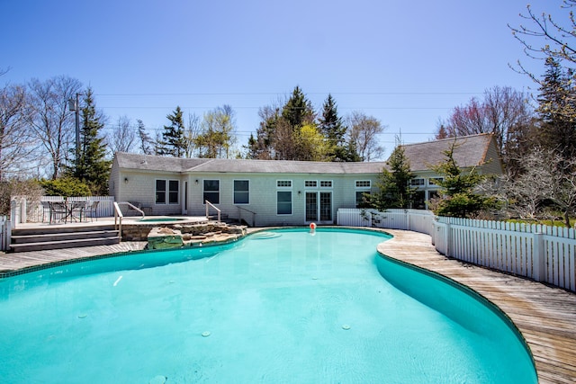 95 Pumpkin Cove Rd, Bristol, ME 04554 - view of pool featuring an in ground hot tub and a wooden deck