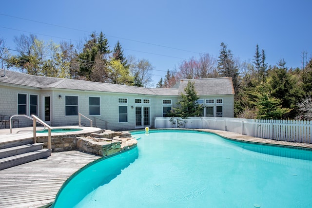 95 Pumpkin Cove Rd, Bristol, ME 04554 - view of pool featuring an in ground hot tub and a deck