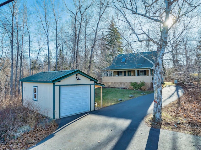 garage with a lawn