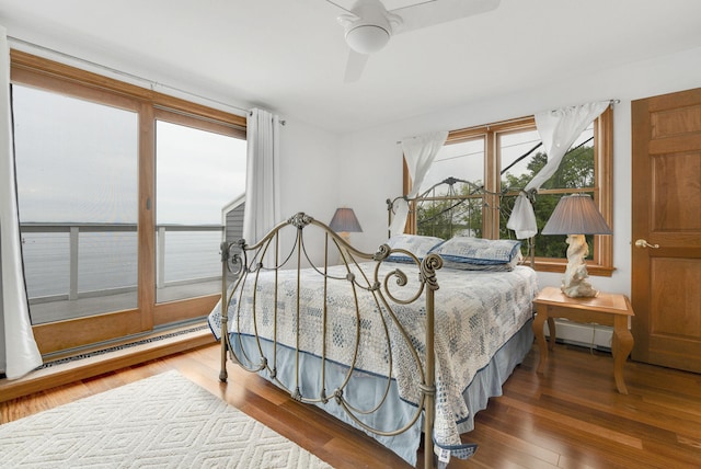 bedroom with hardwood / wood-style floors and ceiling fan