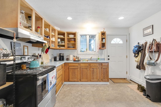 kitchen featuring a textured ceiling, baseboard heating, stainless steel range with electric stovetop, and sink