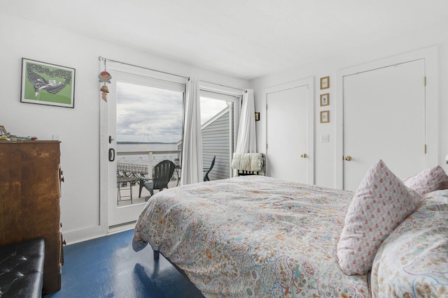 bedroom featuring dark colored carpet