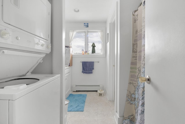 laundry area with light tile patterned floors, a baseboard radiator, and stacked washer and clothes dryer