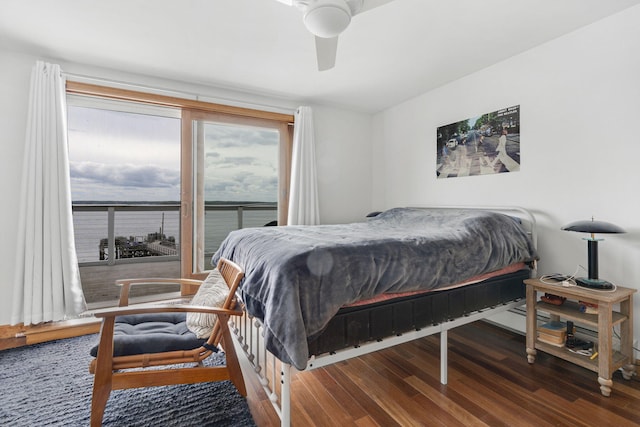 bedroom featuring ceiling fan and dark hardwood / wood-style floors