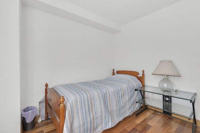 bedroom featuring wood-type flooring