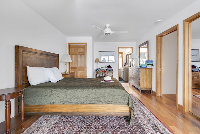 bedroom with hardwood / wood-style flooring and ceiling fan