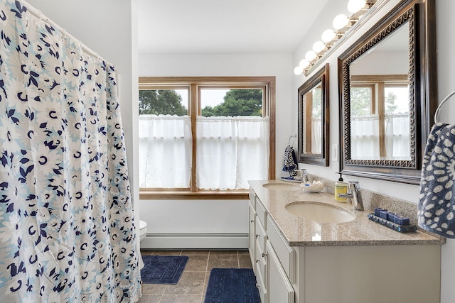 bathroom with baseboard heating, tile patterned flooring, toilet, vanity, and a shower with shower curtain