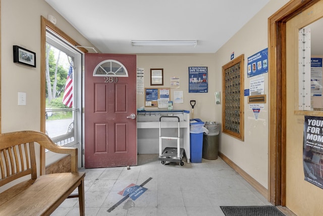 view of tiled foyer entrance