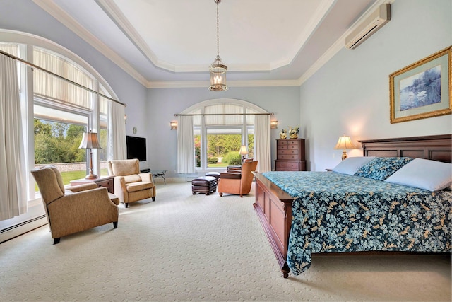 carpeted bedroom featuring crown molding, a wall unit AC, and a tray ceiling