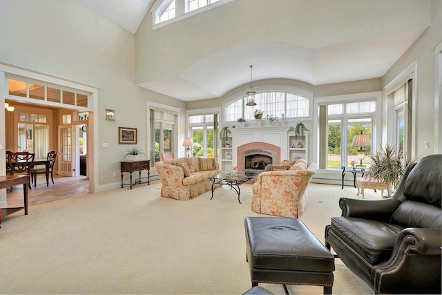 carpeted living room with a baseboard radiator and a high ceiling