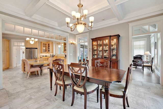 dining room with coffered ceiling, crown molding, sink, beam ceiling, and a notable chandelier