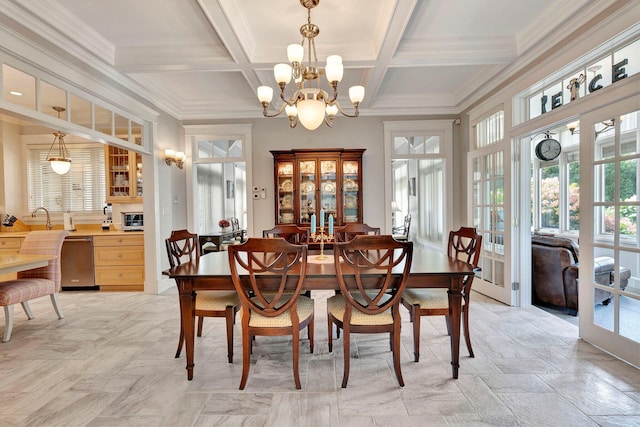 dining space featuring french doors, coffered ceiling, crown molding, a notable chandelier, and beamed ceiling