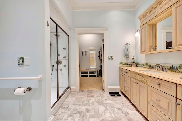 bathroom featuring vanity, walk in shower, and crown molding