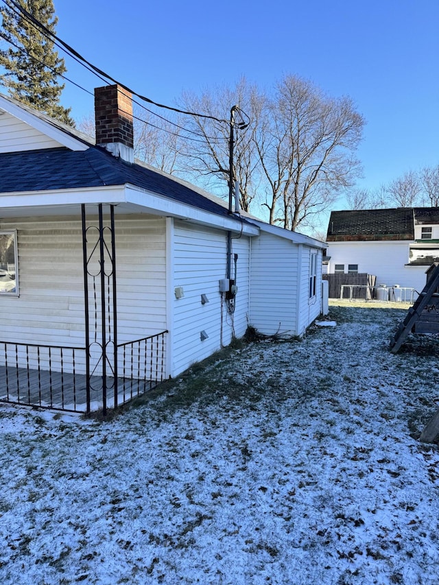 view of snow covered property