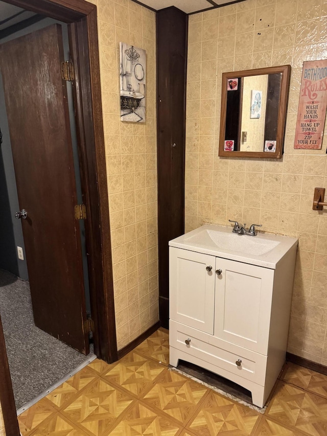 bathroom featuring vanity and parquet floors