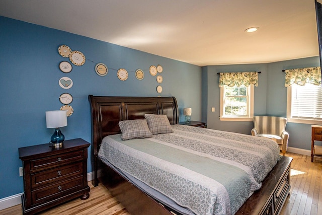 bedroom with light wood-type flooring