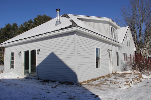 view of snow covered property