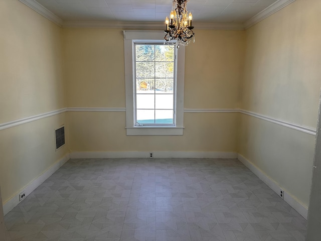 unfurnished room featuring crown molding, light parquet flooring, and an inviting chandelier