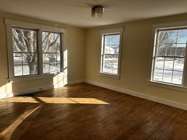 unfurnished dining area featuring dark hardwood / wood-style flooring