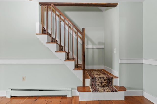 35 Cushman Rd, Nobleboro, ME 04555 - stairs with a baseboard radiator, wood finished floors, and baseboards