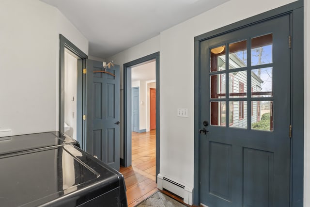 35 Cushman Rd, Nobleboro, ME 04555 - entrance foyer featuring wood-type flooring and a baseboard radiator