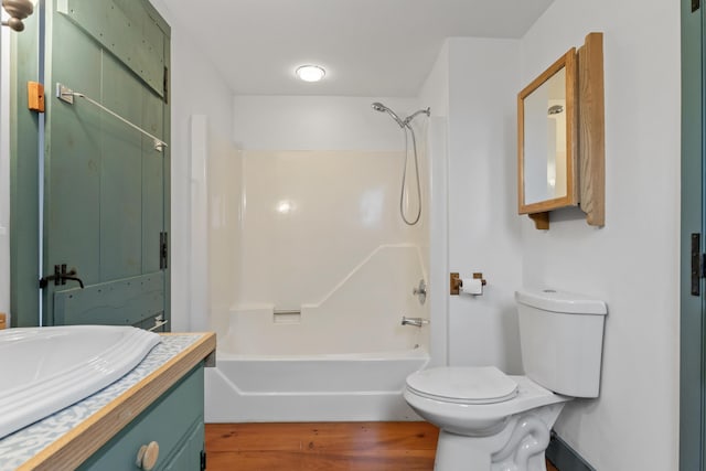 35 Cushman Rd, Nobleboro, ME 04555 - bathroom featuring toilet, vanity, shower / bathing tub combination, and wood finished floors