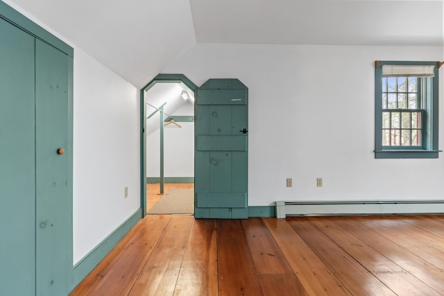 35 Cushman Rd, Nobleboro, ME 04555 - unfurnished room with hardwood / wood-style floors, lofted ceiling, and baseboard heating