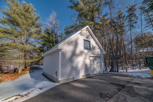 view of snow covered garage