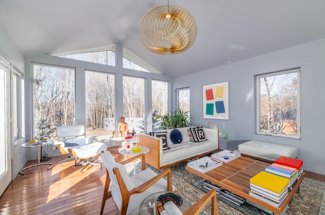 sunroom / solarium with vaulted ceiling