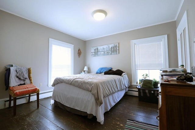 bedroom with a baseboard radiator, multiple windows, and dark hardwood / wood-style floors