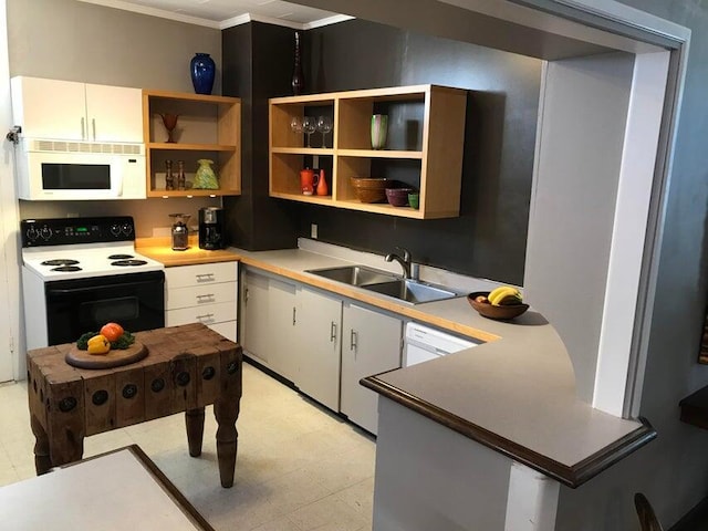 kitchen featuring white cabinets, crown molding, white appliances, and sink